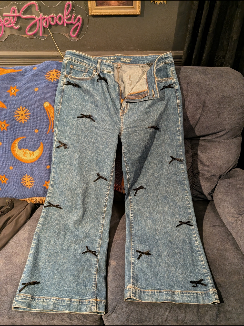 Torrid Light Wash Wide-Leg Jeans with Black Bow Accents